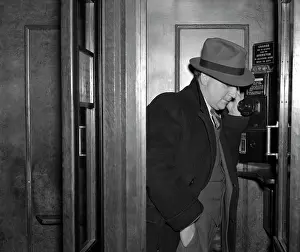 Paneled: 1940s Man Dressed In A Fedora