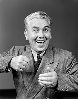 Thrilled: 1940s MAN MAKING FIST AND SMILING