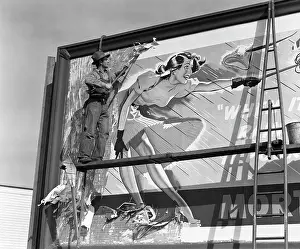 Rainstorm: 1940s Man On Scaffold Scraping