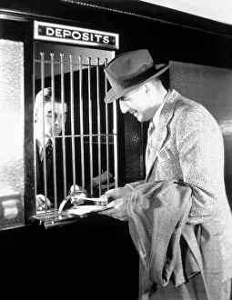 Withdraws: 1940s Man At Tellers Window Of