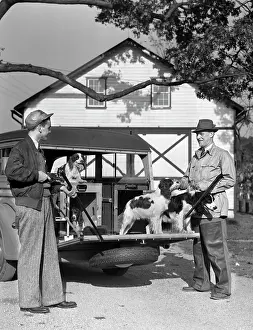 Shotguns: 1940s Two Men Holding Shotguns