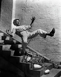 Clumsy: 1940s Milkman Falling Down Stairs