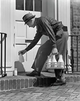 Quart: 1940s Milkman Setting Glass Bottles