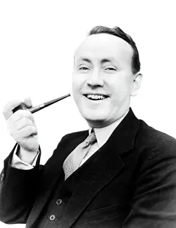 1940s Portrait Man Holding Pipe