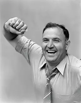 Exuberant: 1940s Portrait Of Man In Shirt