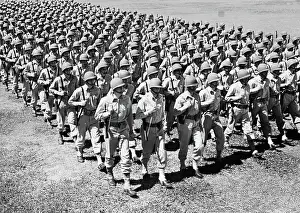 Unison: 1940s ROWS OF USA INFANTRYMEN MARCHING