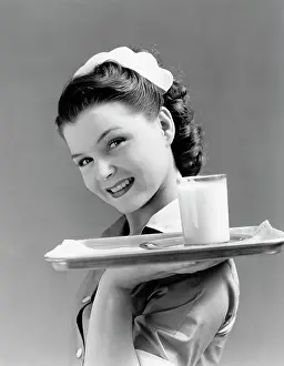 Server: 1940s Smiling Waitress Carrying