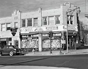 Hydrant: 1940s storefront drugstore windows full of products