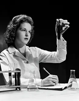 Progressing: 1940s Student Nurse Holding Up