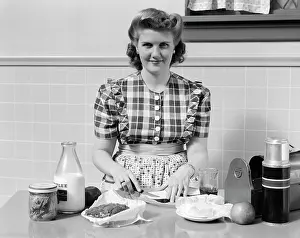 Lunchbox: 1940s Woman Smiling In Kitchen