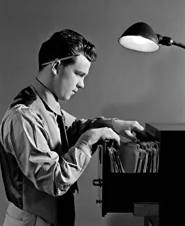 1940s Young Man Office File Clerk