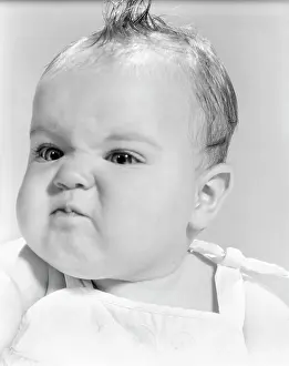 Odor: 1950s 1960s Baby Face Expression