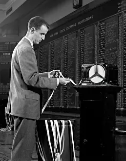Businesspeople: 1950s 1960s Stockbroker Reading