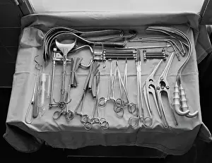 Sterile: 1950s 1960s TRAY DISPLAYING AN ARRAY OF MEDICAL