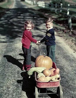 Gourds: 1950s 2 Kids In Blue Jeans Pulling