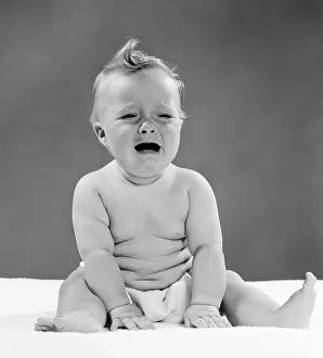 Streaming: 1950s Baby Seated With Distressed