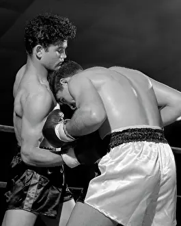 Punched: 1950s Boxer Being Punched In Stomach