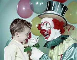 Headware: 1950s Boy Smiling Smell Smelling