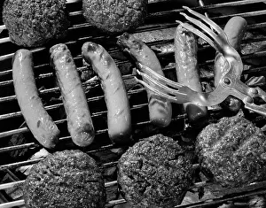 Frankfurters: 1950s Close-Up Of Grill Filled