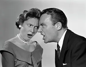 Disagree: 1950s Couple Arguing Yelling Foreheads