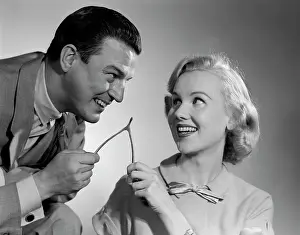 Grown Up: 1950s Couple Pulling and Breaking a Wishbone for Luck Tra