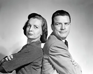 Disagree: 1950s Couple Sitting Back To Back