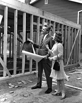 Blueprints: 1950's couple standing in front of their new extension