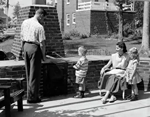 Cookout: 1950s Family On Bricked Backyard