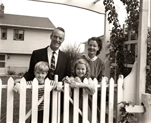 Homeowner: 1950s Family Of Four Behind Picket