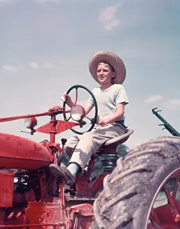 1950s Farm Boy Wearing Straw Hat
