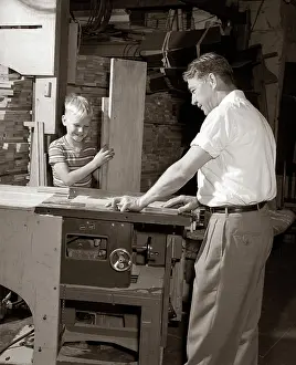 Craftspeople: 1950s Father Teaching Son Carpentry