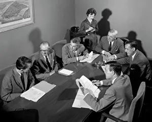 Businesspeople: 1950s Group Of Businessmen Having