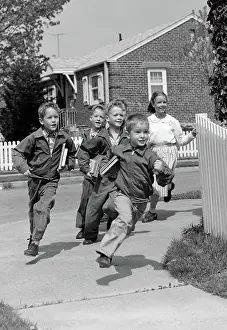Aerobic: 1950s GROUP OF SCHOOL CHILDREN RUNNING AROUND