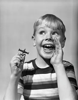 Cupped: 1950s Happy Boy Looking To Side