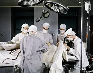 Sterile: 1950s hospital operating room surgery in progress