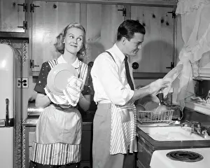Wipe: 1950s Husband And Wife Drying
