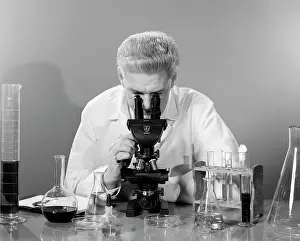 Beaker: 1950s Man In Lab Coat Sitting