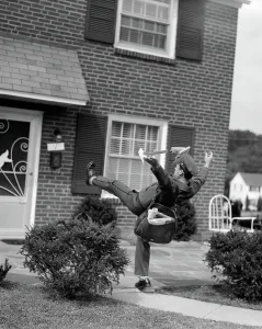 Flagstone: 1950s MAN MAILMAN TRIPPING FALLING IN FRONT OF