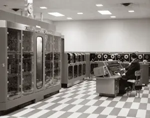 Businesspeople: 1950s Man Programmer Sitting At