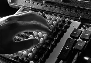 Minus: 1950s Mans Hand About To Press