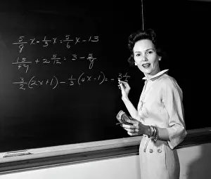 Eraser: 1950s Math Teacher Standing In