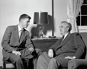 Mentoring: 1950s Two Men Sitting In Living