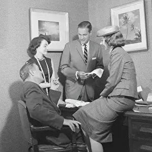 Businesswomen: 1950s Two Men And Two Women Discussing