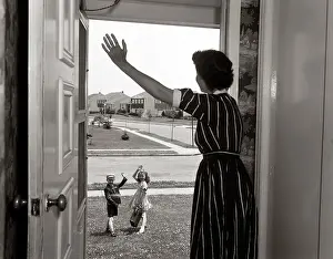 Schoolbag: 1950s Mom In Doorway Waving At
