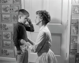 Consolation: 1950s Mother Consoling Helping