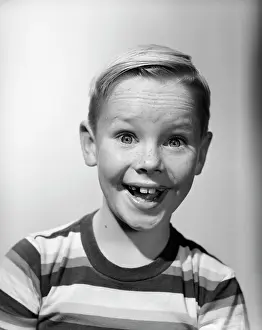 Elated: 1950s Portrait Happy Smiling Boy
