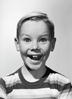Elated: 1950s Portrait Happy Smiling Boy