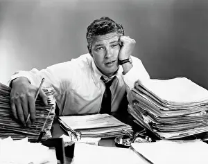 Businesspeople: 1950s Portrait Man Overworked