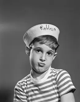 Monogramed: 1950s Portrait Sad Pouting Boy