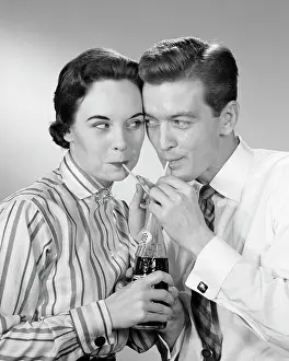 Straws: 1950s - Romantic Couple Head to Head Sharing a Soda Pop